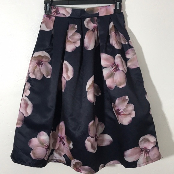 Dresses & Skirts - Navy floral below the knee pleated midi skirt